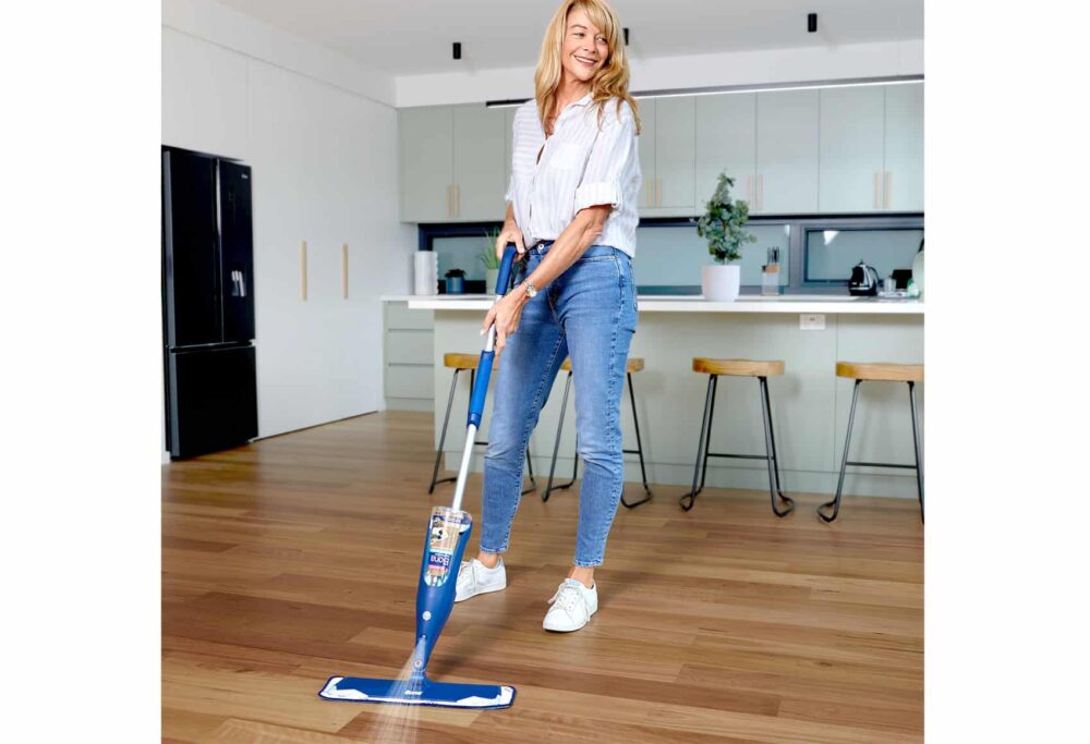 Bona Wood Floor Spray Mop wide image in use spraying timber floor