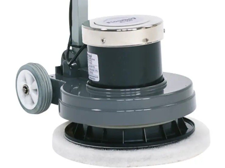 The FloorBoy XL-300's 300mm drive disc fitted with a white buffing pad, with the transport wheel alongside.